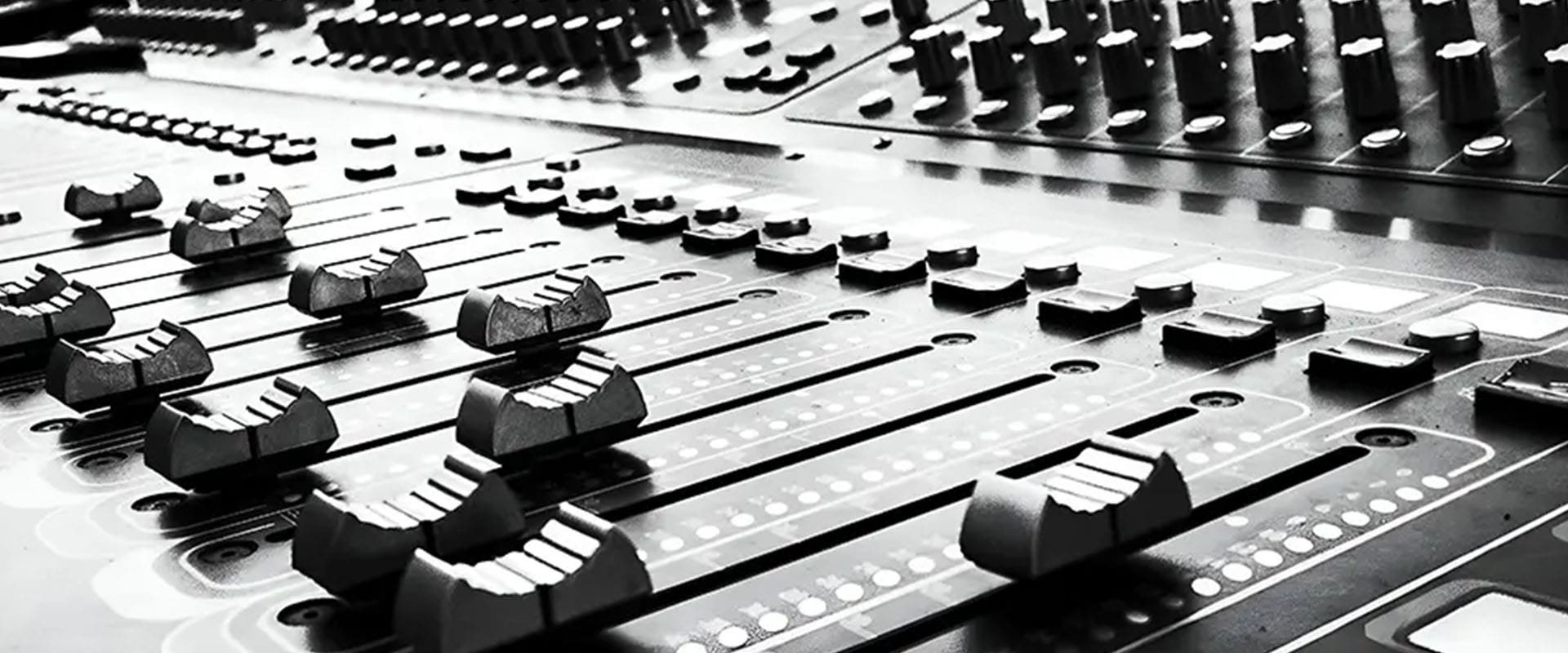 A close up of some sound boards in black and white